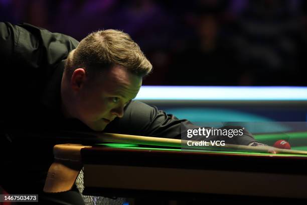 Shaun Murphy of England plays a shot in the semi-final match against Pang Junxu of China on day six of 2023 Betvictor Welsh Open at Venue Cymru on...