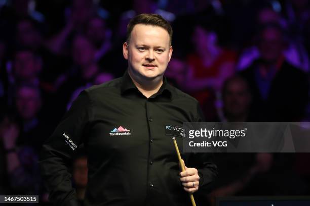 Shaun Murphy of England reacts in the semi-final match against Pang Junxu of China on day six of 2023 Betvictor Welsh Open at Venue Cymru on February...