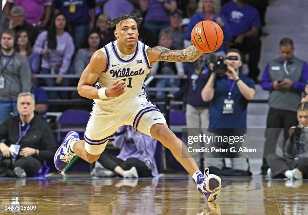 Keyontae Johnson of the Kansas State Wildcats runs down a loose ball during a game in the second half against the Iowa State Cyclones at Bramlage...