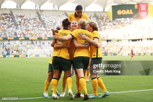 Clare Polkinghorne of Australia celebrates with team mates after scoring a goal during the 2023 Cup of Nations Match between Australian Matildas and...