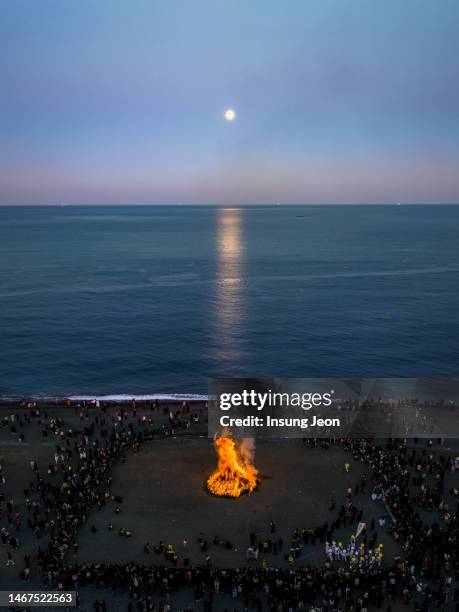 the first full moon holiday (daeboreum) - bonfire stock pictures, royalty-free photos & images