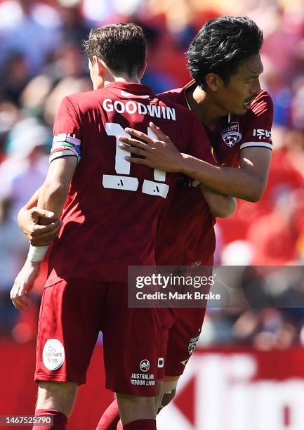 Hiroshi Ibusuki of Adelaide United celebrates after scoring his teams third goal with Craig Goodwin of Adelaide United during the round 17 A-League...