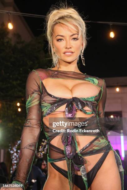 Lindsey Pelas poses at the MAXIM Carnival Mardi Gras celebration at EDEN Sunset on February 18, 2023 in Los Angeles, California.