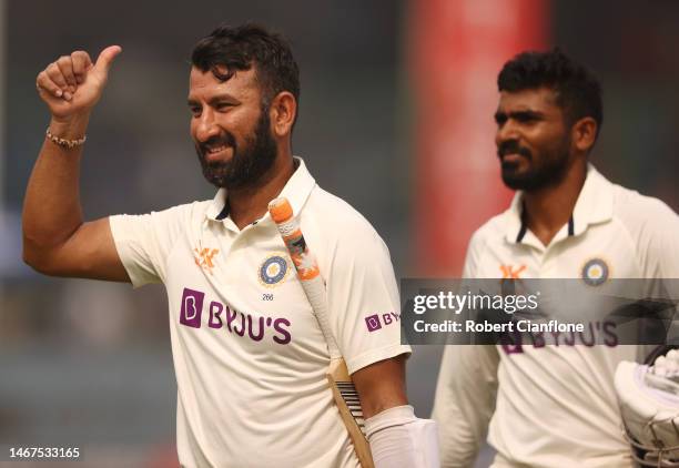 Cheteshwar Pujara of India celebrates after India defeated Australia during day three of the Second Test match in the series between India and...