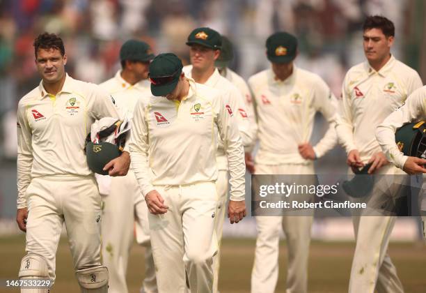 Pat Cummins of Australia leads the team off the ground after they were defeated by India during day three of the Second Test match in the series...