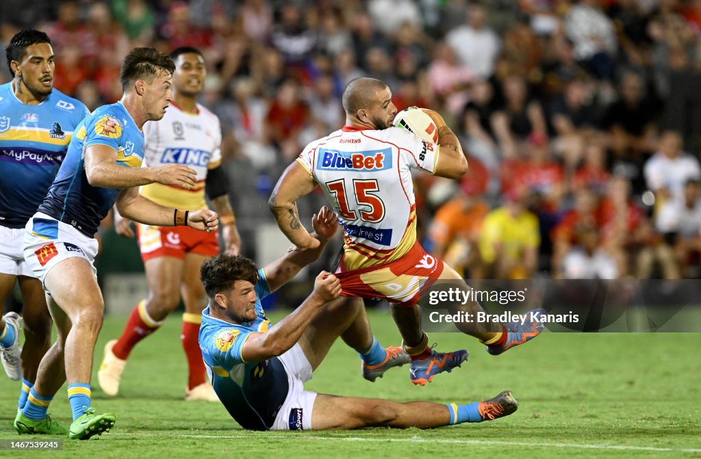 Ray Stone Ray Stone of the Dolphins is tackled during the NRL Trial Match... News ...
