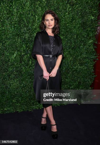 Lily James attends the Charles Finch x CHANEL Pre-BAFTA Dinner at 5 Hertford Street on February 18, 2023 in London, England.