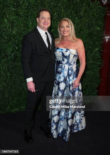 Brendan Fraser and Jeanne Moore attend the Charles Finch x CHANEL Pre-BAFTA Dinner at 5 Hertford Street on February 18, 2023 in London, England.