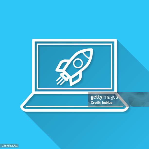 laptop with rocket. icon on blue background - flat design with long shadow - missile launch stock illustrations