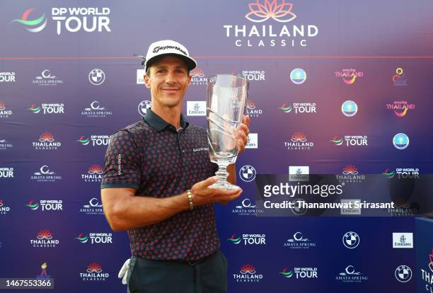 Thorbjorn Olesen of Denmark poses with the Thailand Classic Trophy after winning the Thailand Classic at Amata Spring Country Club on February 19,...