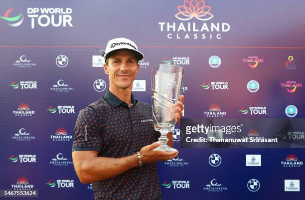 Thorbjorn Olesen of Denmark poses with the Thailand Classic Trophy after winning the Thailand Classic at Amata Spring Country Club on February 19,...