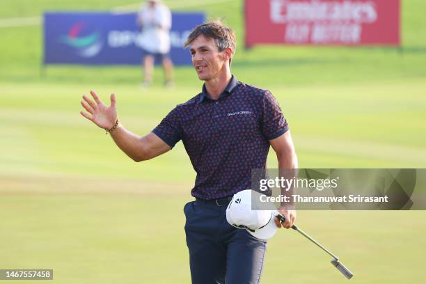 Thorbjorn Olesen of Denmark celebrates after putting on the 18th green to win the Thailand Classic at Amata Spring Country Club on February 19, 2023...