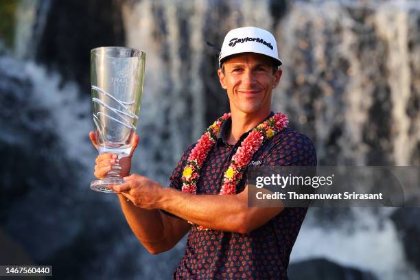 Thorbjorn Olesen of Denmark poses with the Thailand Classic Trophy after winning the Thailand Classic at Amata Spring Country Club on February 19,...