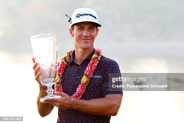 Thorbjorn Olesen of Denmark poses with the Thailand Classic Trophy after winning the Thailand Classic at Amata Spring Country Club on February 19,...