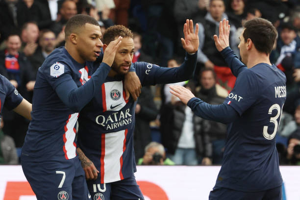 Neymar Jr of Paris Saint-Germain celebrate his first goal with Kylian Mbappe and Lionel Messi during the Ligue 1 match between Paris Saint-Germain...