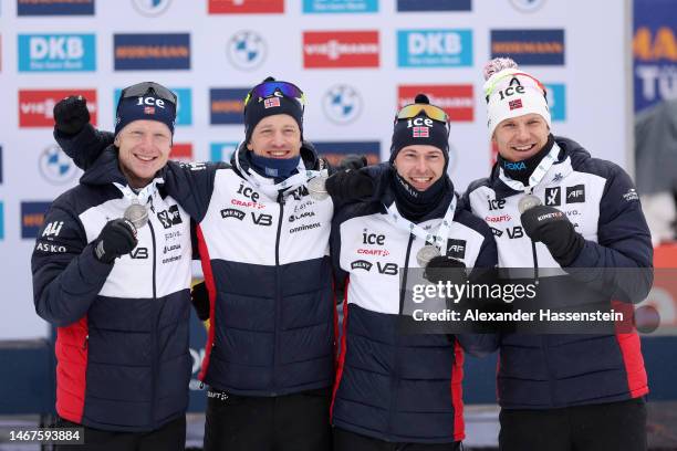 Silver medalist Johannes Thingnes Boe of Norway, Tarjei Boe of Norway, Sturla Holm Laegreid of Norway and Vetle Sjaastad Christiansen of Norway pose...