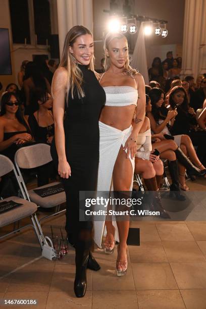 Zara McDermott and Tammy Hembrow attend the Oh Polly's Runway Show at London Fashion Week 2023 at St. John's Hyde Park on February 18, 2023 in...