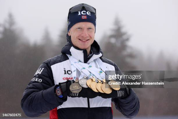 Johannes Thingnes Boe of Norway poses for a photo with all their medals during the medal ceremony for the Men 15 km Mass Start at the IBU World...