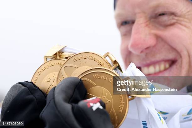 Johannes Thingnes Boe of Norway poses for a photo with all their medals during the medal ceremony for the Men 15 km Mass Start at the IBU World...