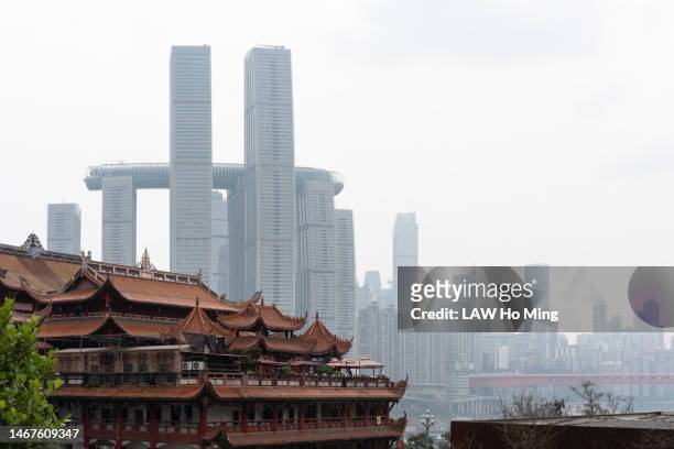 ancient and modern architecture in chongqing - chongqing stockfoto's en -beelden