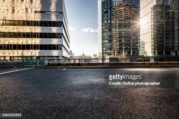 city parking lot - horizontal road stock pictures, royalty-free photos & images