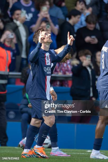 Lionel Messi of Paris Saint-Germain celebrates his last-minute winning goal from a free kick during his side's dramatic 4-3 victory during the Paris...