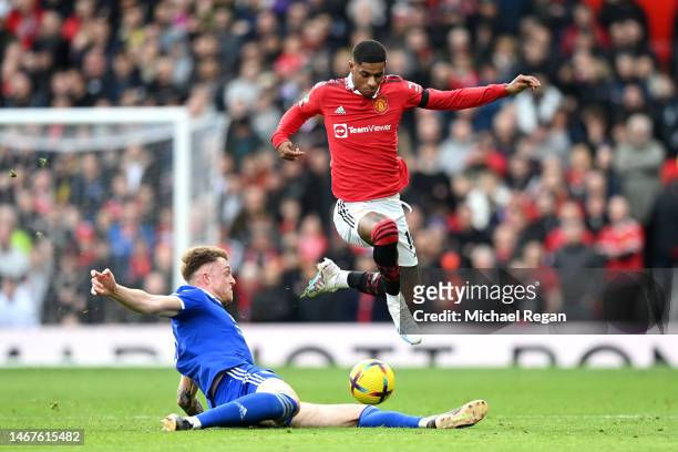 Marcus Rashford of Manchester United is challenged by Harry Souttar of Leicester City during the Premier League match between Manchester United and...