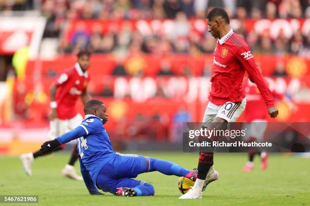 Marcus Rashford of Manchester United is tackled by Nampalys Mendy of Leicester City during the Premier League match between Manchester United and...