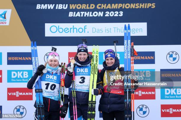 Silver medalist Ingrid Landmark Tandrevold of Norway, gold medalist Hanna Oeberg of Sweden and bronze medalist Julia Simon of France pose for a photo...