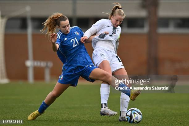 Sofia Testa of Italy U17 competes for the ball with Zara Kramzar of Slovenia U17 during the Women International Friendly match between Italy U17 and...
