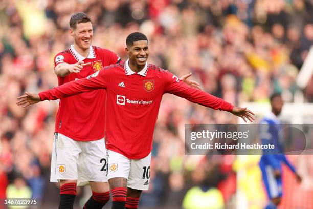 Marcus Rashford of Manchester United celebrates after scoring the team's second goal with teammate Wout Weghorst during the Premier League match...