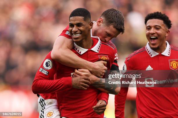 Marcus Rashford of Manchester United celebrates after scoring the team's second goal with teammate Wout Weghorst during the Premier League match...