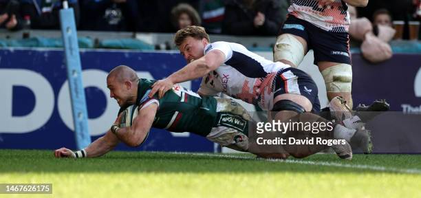 Mike Brown of Leicester Tigers dives to score their third try during the Gallagher Premiership Rugby match between Leicester Tigers and Saracens at...