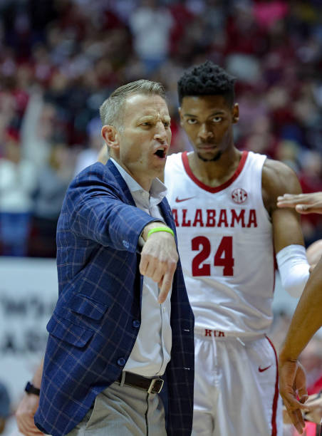 Head coach Nate Oats of the Alabama Crimson Tide gives instruction during a first half timeout against the Georgia Bulldogs at Coleman Coliseum on...