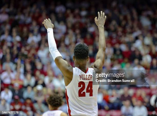Brandon Miller of the Alabama Crimson Tide salutes the crowd after a first half three pointer against the Georgia Bulldogs at Coleman Coliseum on...
