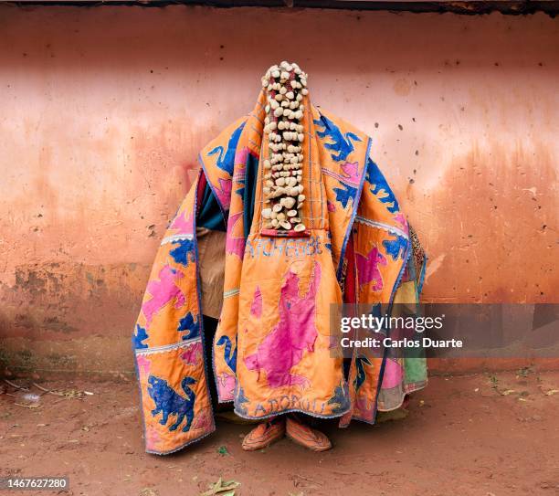 egungun performs in a abomei city festival - gimp mask stock pictures, royalty-free photos & images