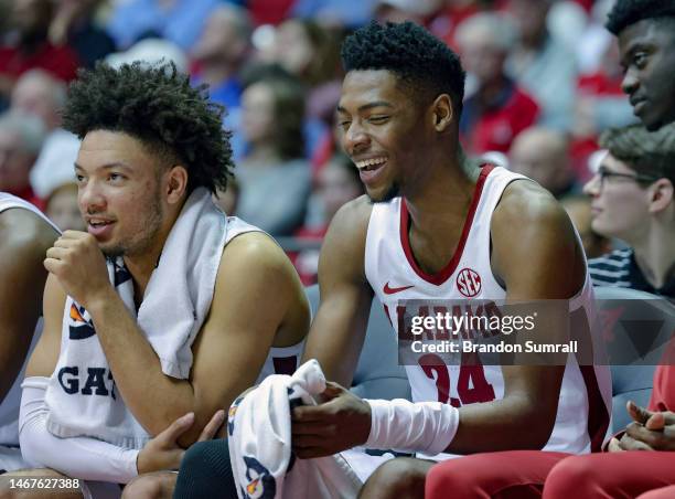 Mark Sears and Brandon Miller of the Alabama Crimson Tide share a laugh during the second half against the Georgia Bulldogs at Coleman Coliseum on...