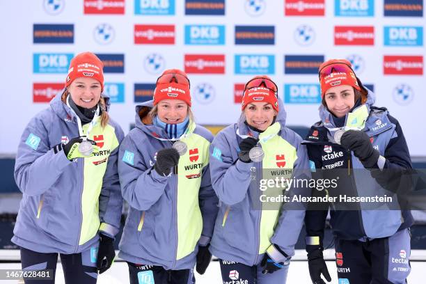 Silver medalists Denise Herrmann-Wick of Germany, Sophia Schneider of Germany, Hanna Kebinger of Germany and Vanessa Voigt of Germany pose for a...