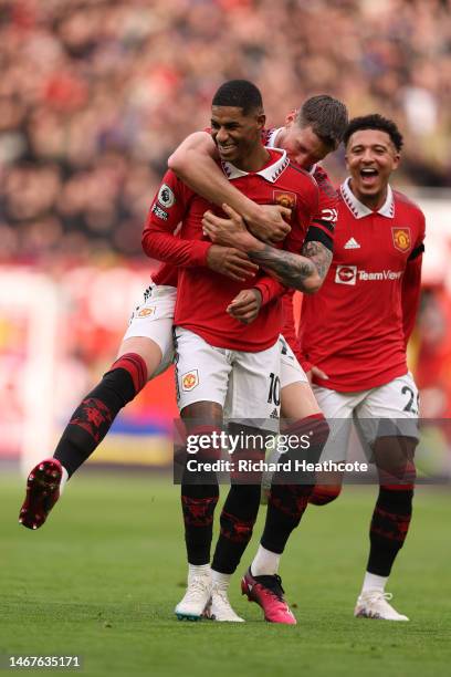 Marcus Rashford of Manchester United celebrates after scoring the team's second goal with teammate Wout Weghorst during the Premier League match...