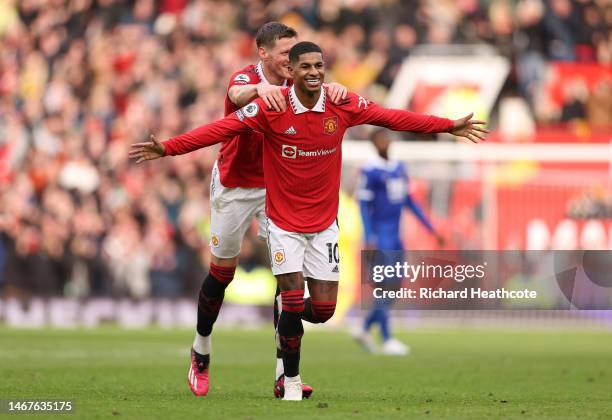 Marcus Rashford of Manchester United celebrates after scoring the team's second goal with teammate Wout Weghorst during the Premier League match...