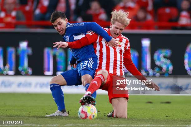 Mehmet Can Aydin of FC Schalke 04 challenges Morten Thorsby of 1.FC Union Berlin during the Bundesliga match between 1. FC Union Berlin and FC...