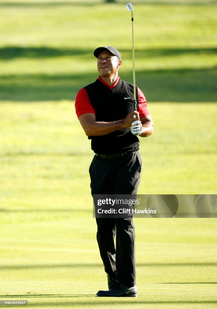 Tiger Woods of the United States plays his second shot on the second Tiger Woods of the United States plays his second shot on the second