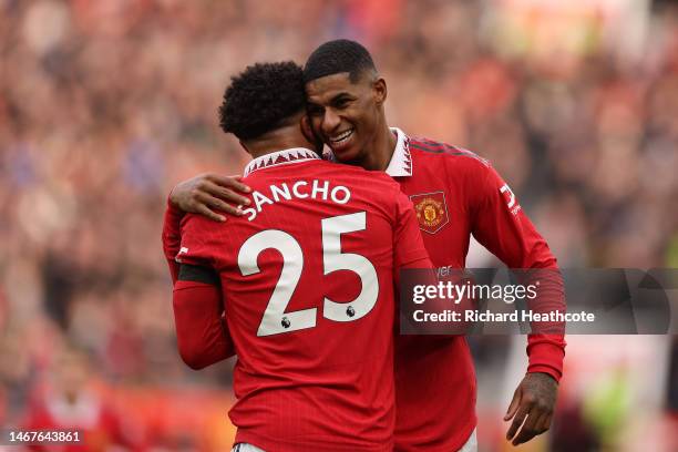 Marcus Rasford of Manchester United celebrates with Jadon Sancho after scoring the second goal during the Premier League match between Manchester...