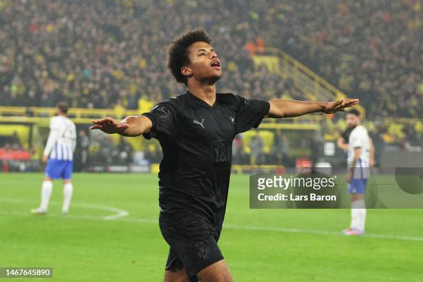 Karim Adeyemi of Borussia Dortmund celebrates after scoring the team's first goal during the Bundesliga match between Borussia Dortmund and Hertha...