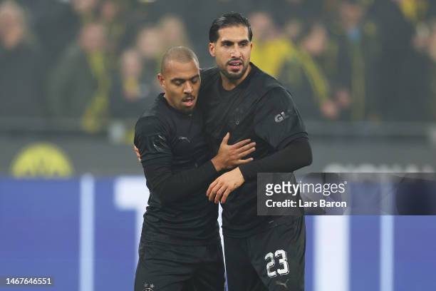Donyell Malen of Borussia Dortmund celebrates after scoring the team's second goal with teammate Emre Can during the Bundesliga match between...
