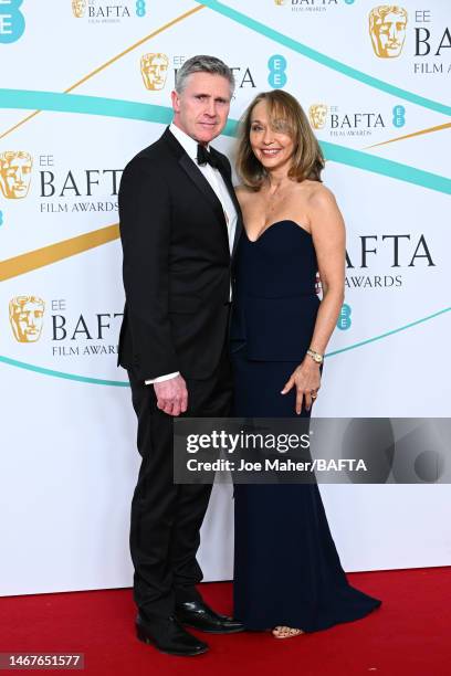 Dominic Tuohy and guest attend the EE BAFTA Film Awards 2023 at The Royal Festival Hall on February 19, 2023 in London, England.