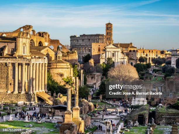 panoramic view of the roman forum at sunset, rome, italy - foro romano foto e immagini stock