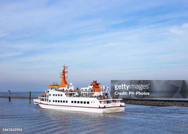 ferry langeoog iii located at bensersiel, north-sea, east frisia. lower saxony, germany-2023 - langeoog stock pictures, royalty-free photos & images