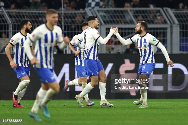 Lucas Tousart of Hertha Berlin celebrates after scoring the team's first goal with teammates during the Bundesliga match between Borussia Dortmund...
