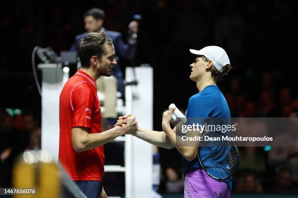 Daniil Medvedev embraces Jannik Sinner of Italy after the Men's Singles Final on the seventh and final day of the 50th ABN AMRO Open 2023 at...